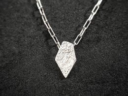 Modern unisex geometric fired pendant in a link chain