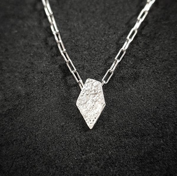 Modern unisex geometric fired pendant in a link chain