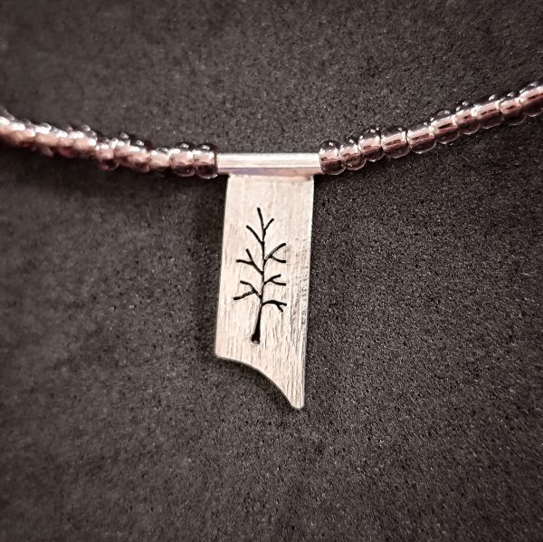 Silver Tree pendant in a glass beads necklace
