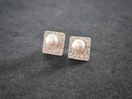 Silver stud earrings with fresh water pearl