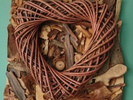 Wood log shavings with bamboo heart wall art feature