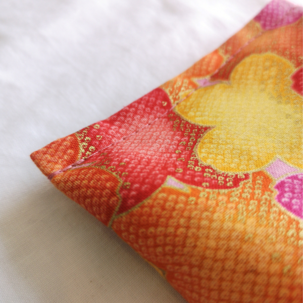 Lavender eye pillow orange daisies close up detail