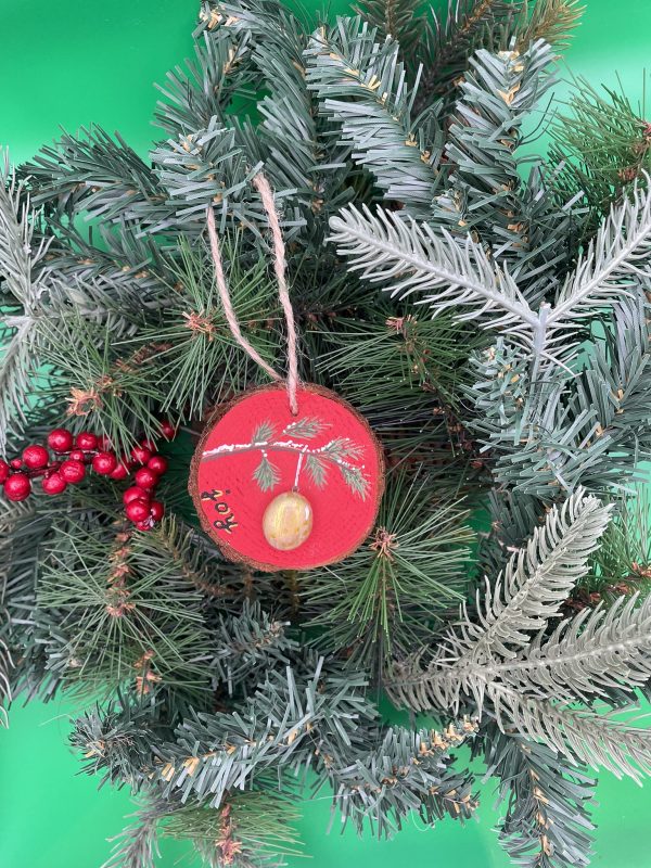 Pebble Ornaments On Wood Slices