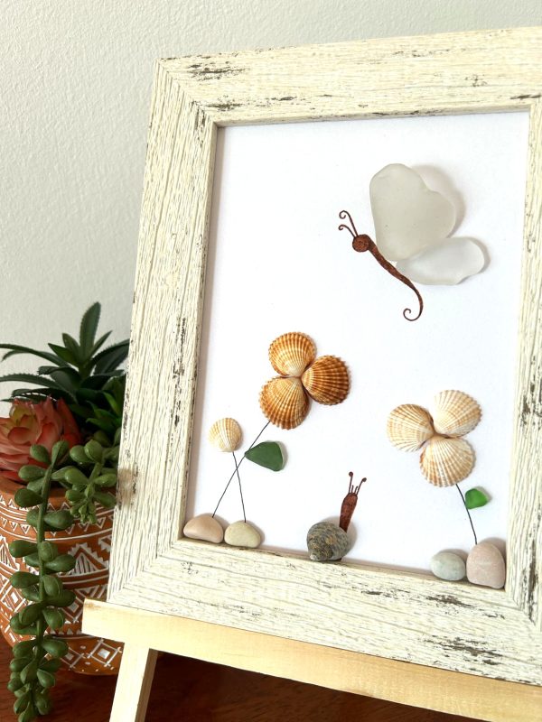 A lovely scene with a butterfly, snail, and flowers, made with seaglass and seashells, perfect as a unique gift! - Image 7