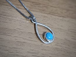 Silver turquoise drop pendant in silver square chain