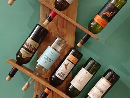 Repurposed pine, wall-mounted bottle rack