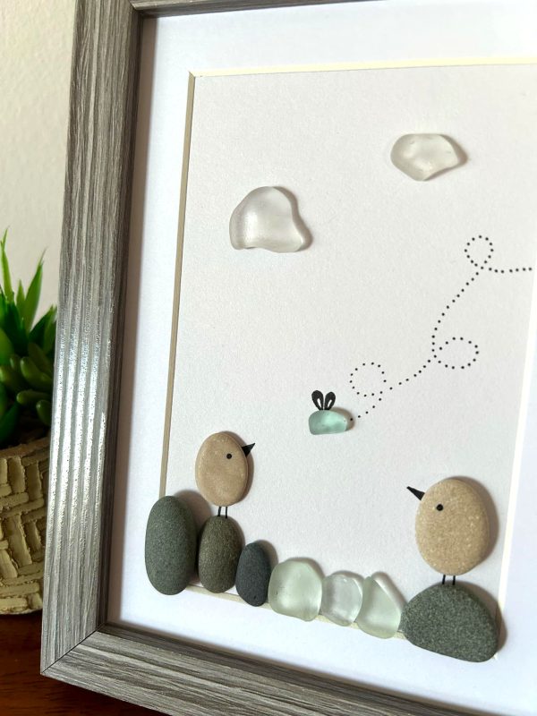 Seaglass Artwork with Birds and Clouds