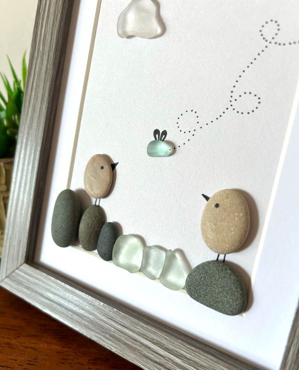 Seaglass Artwork with Birds and Clouds