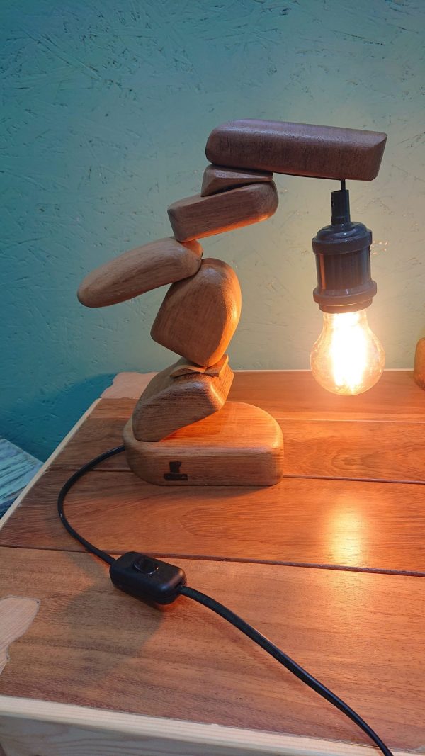 One of a kind table lamp that finds it's inspiration from the beautiful beach stone stacking art style