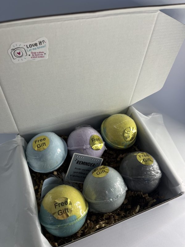 Box with bath bomb with toy inside