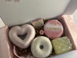 Box with three bath bombs and one natural massage soap