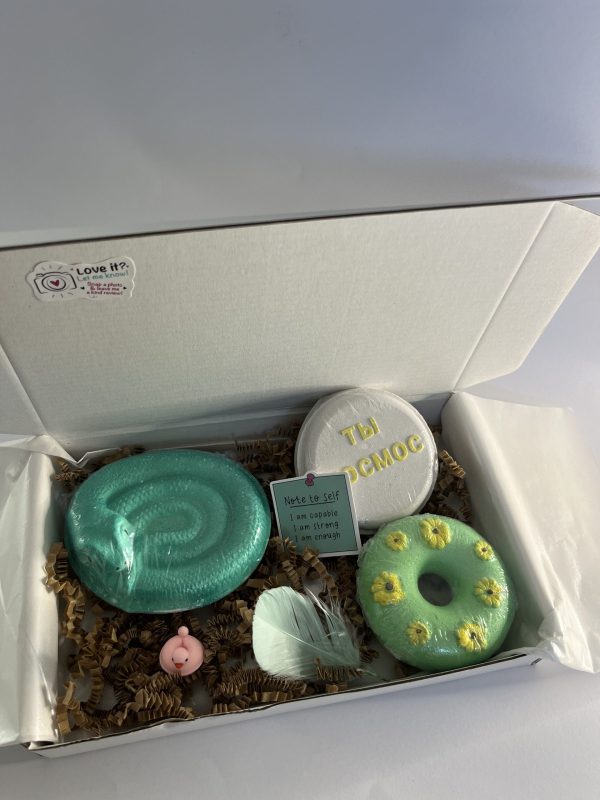 Box with three bath bombs