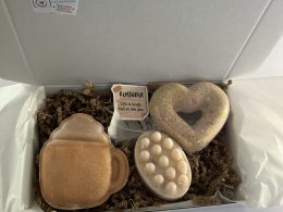 Box with natural massage soap and two bath bombs