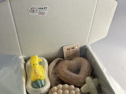 Box with two bath bombs and one massage soap with loofh one soap for kids