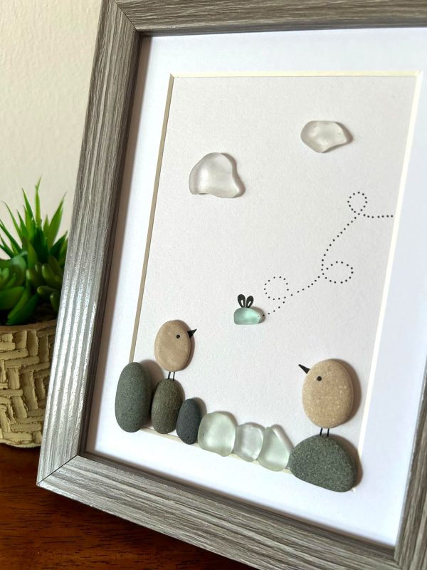 Seaglass Artwork with Birds and Clouds