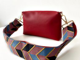 red-messenger-bag-with-chevrons-strap front