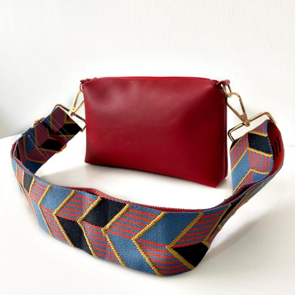 red-messenger-bag-with-chevrons-strap front