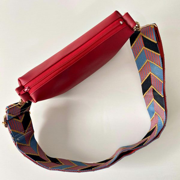red-messenger-bag-with-chevrons-strap top